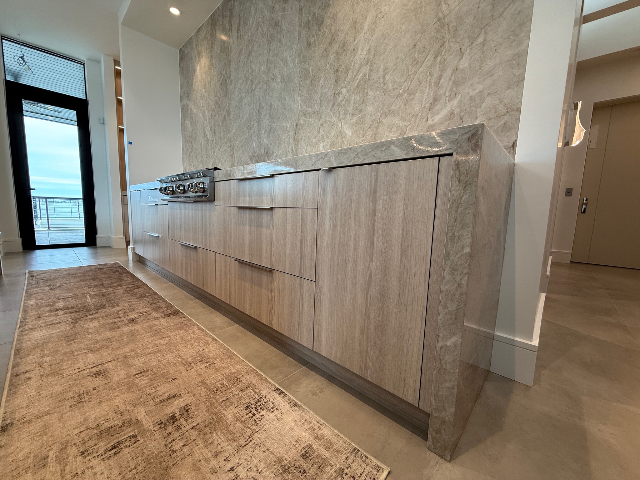 Walk-in shower granite wall panels